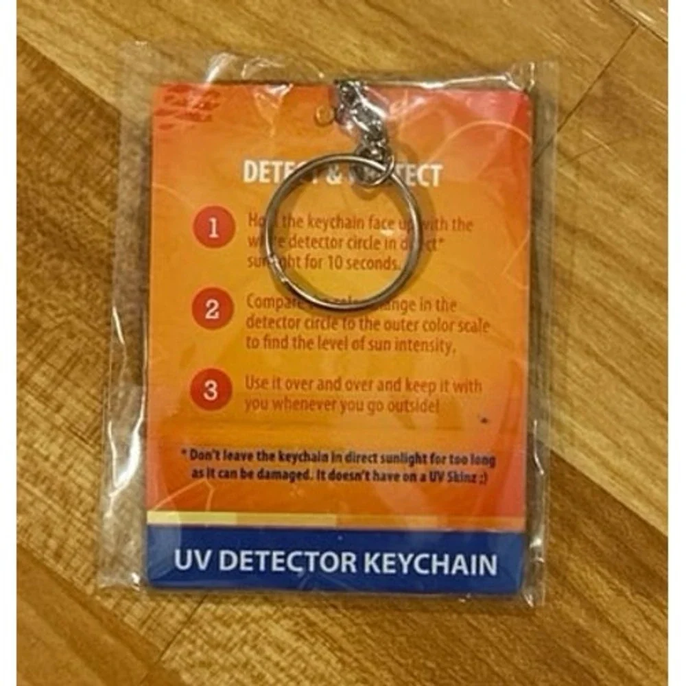UV Skinz UV Detector Keychain Plastic Detect and Protect Skin from Sun's UV Rays